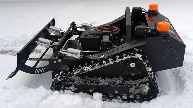 remote-controlled lawn mower with snow plow snow blade snow shovel snow removal machine